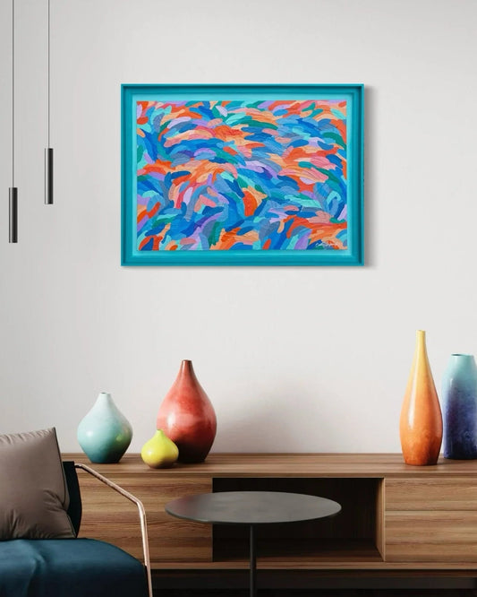 Modern living room with a colorful abstract painting on the wall, wooden cabinet, and decorative vases.
