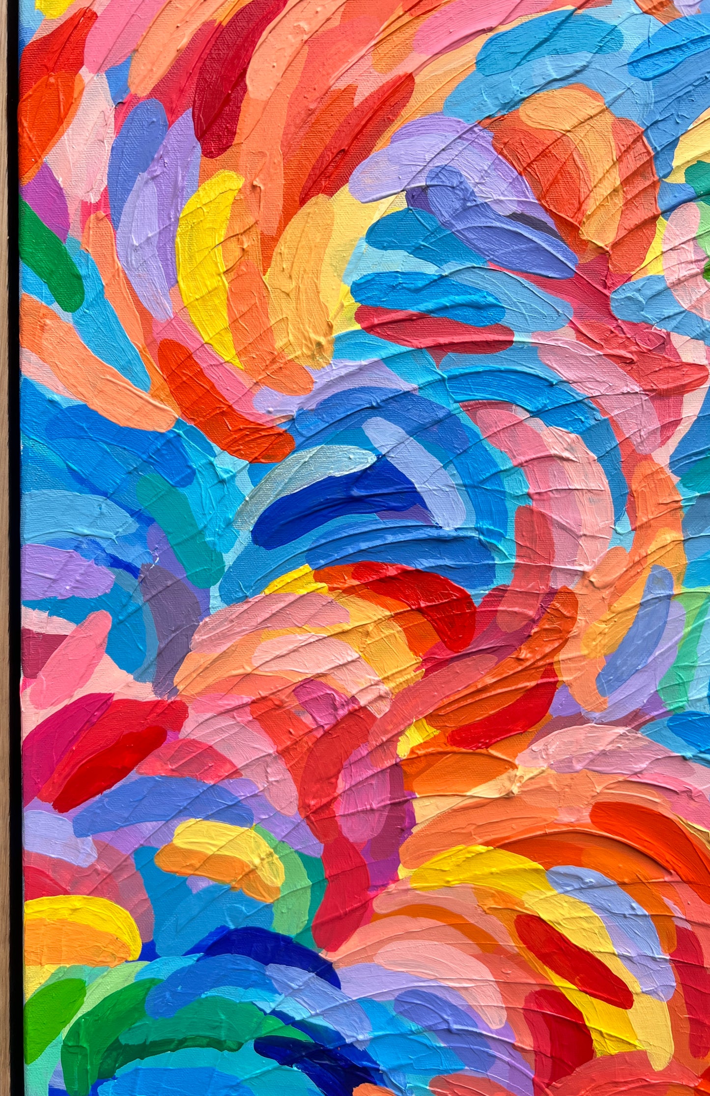 Abstract textured painting with thick impasto brushstrokes in swirling waves of blue, orange, red, yellow, pink, purple, and green.