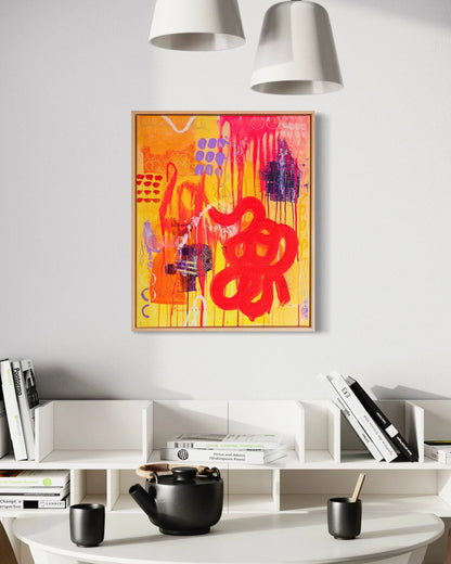 Modern interior with a round white table, chairs, and a colorful abstract painting on the wall.