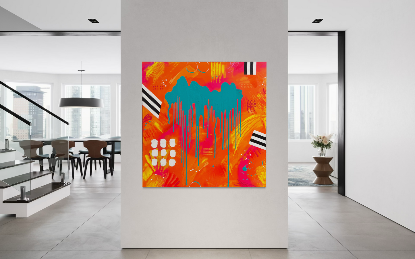 Colorful abstract painting on a white wall in a modern interior setting